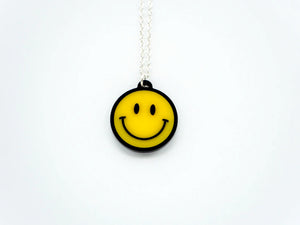 Small Smiley necklace by Designosaur